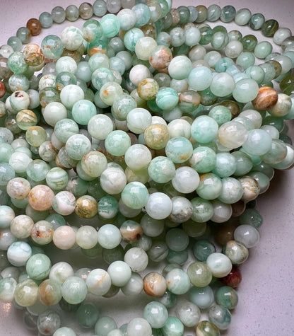 GREEN QUARTZ- emotional balance, good fortune, growth & success